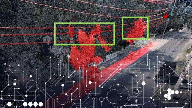 A view of a street with red highlighting of part of the street and trees, showing LiDAR used to provide corridor clearance assessments